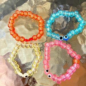 Clear beaded bracket with evil eyes!